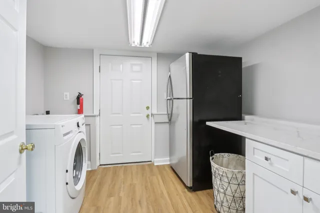 a view of kitchen and utility room