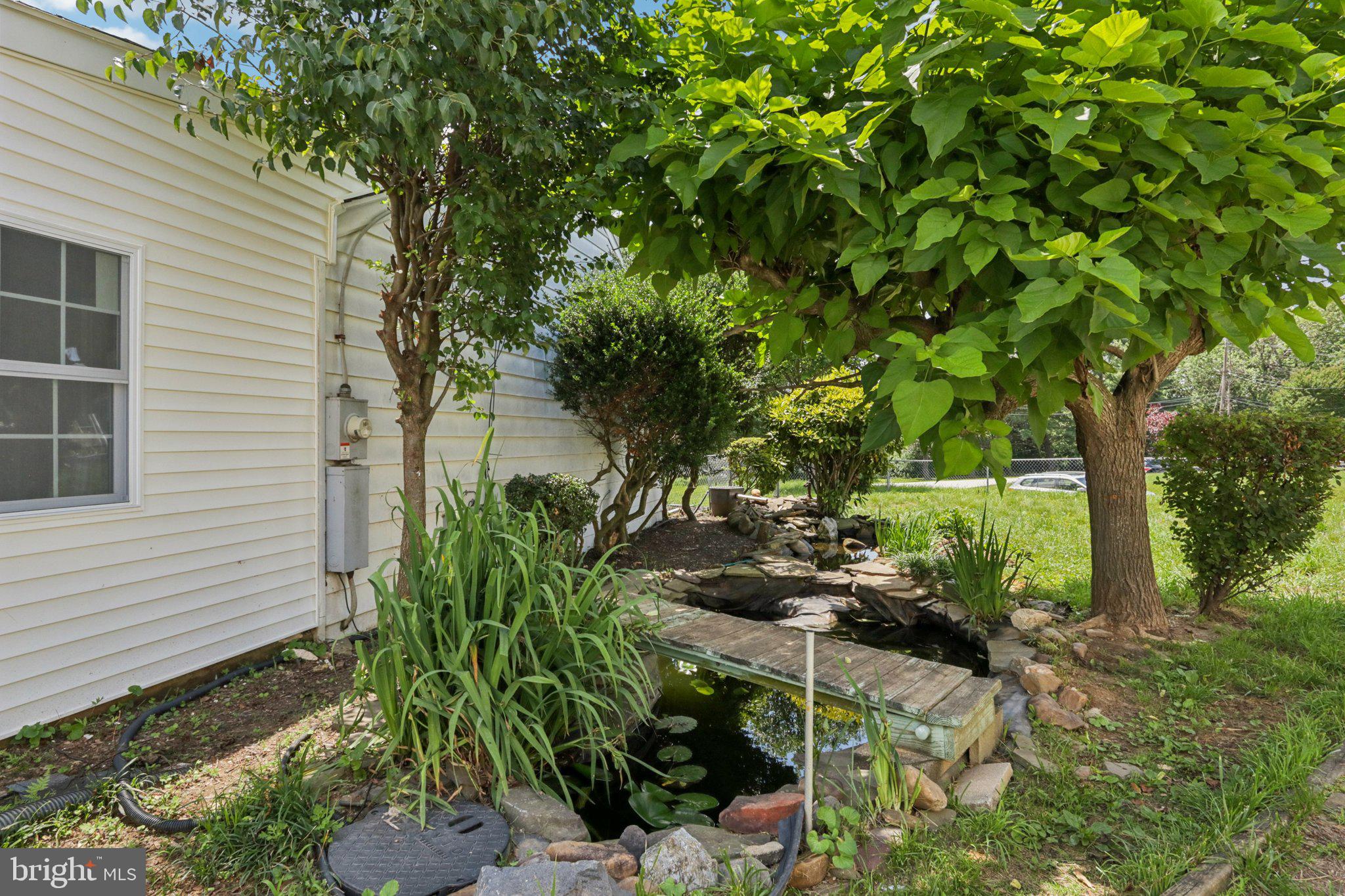 1 Russell Road New Castle, DE 19720 - Photo 45 of 49 a backyard of a house with lots of green space
