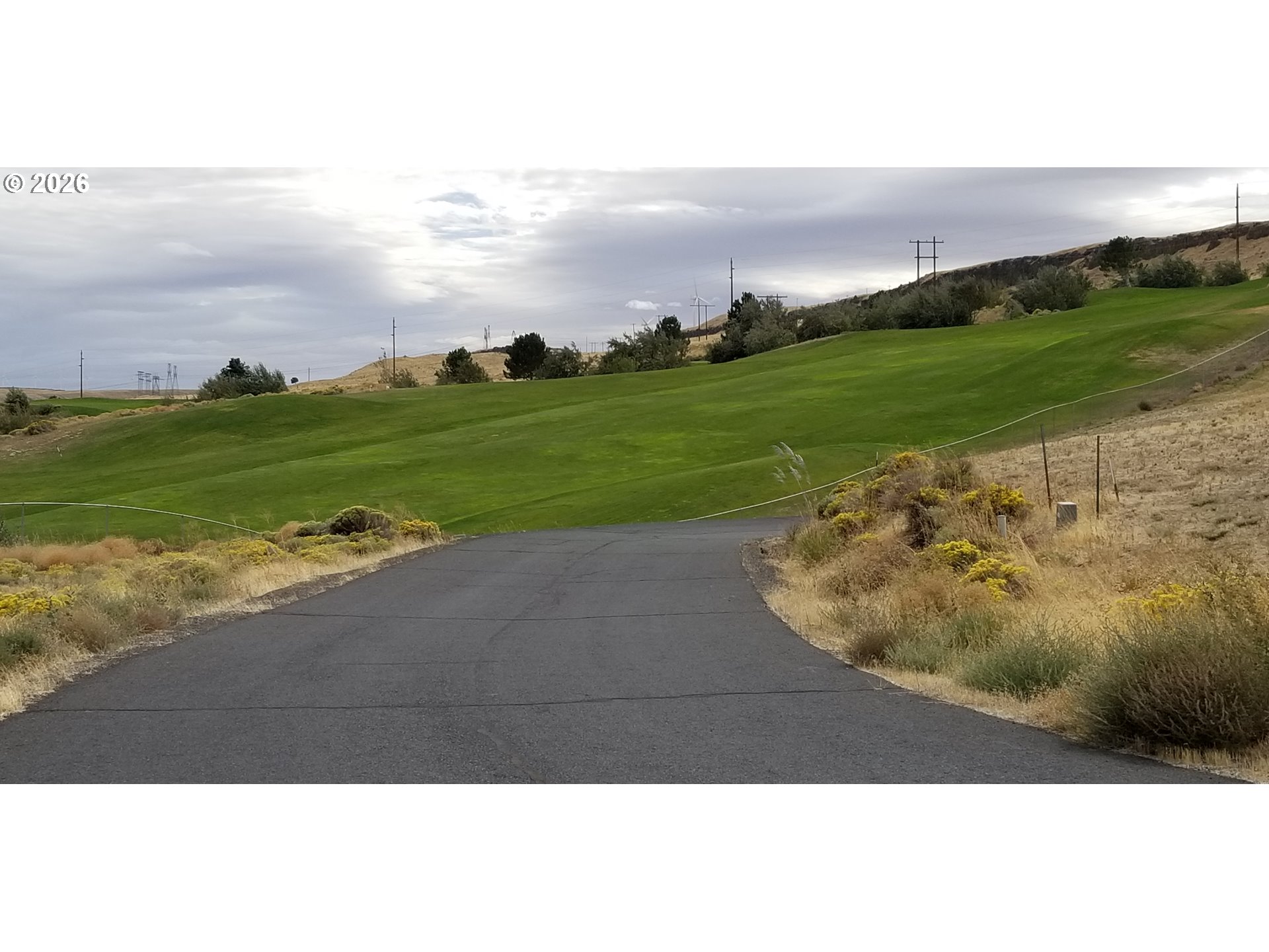 1225 Fairway Loop Arlington, OR 97812 - Photo 4 of 15 a view of a lake with an outdoor space