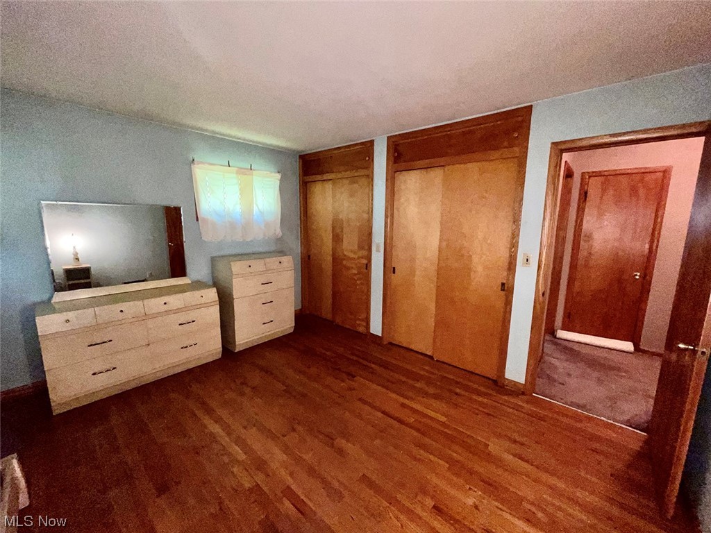 3371 Biltz Road Kent, OH 44240 - Photo 6 of 8 Bedroom with dark hardwood floors