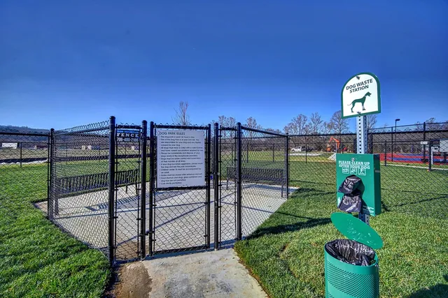 a view of street with parked cars