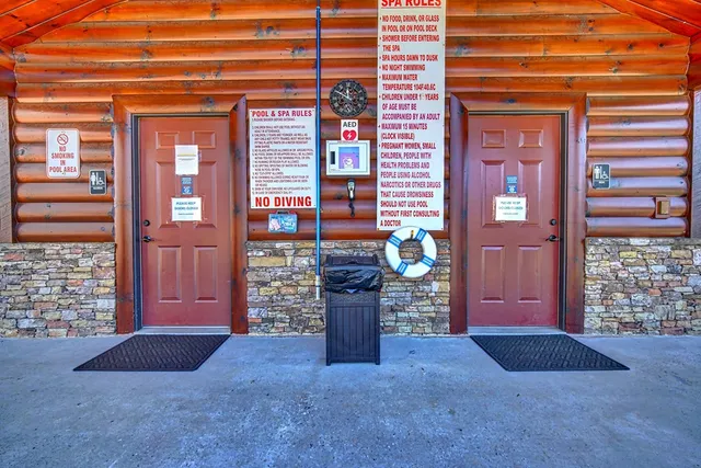 an aerial view of a house a yard and a table and chairs
