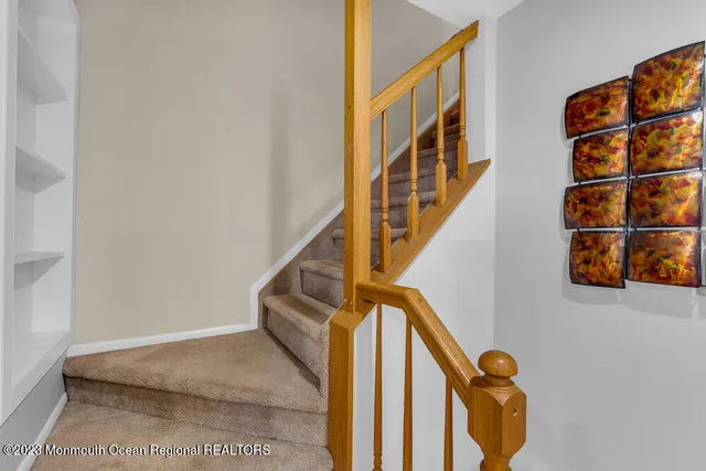 a view of entryway with a front door