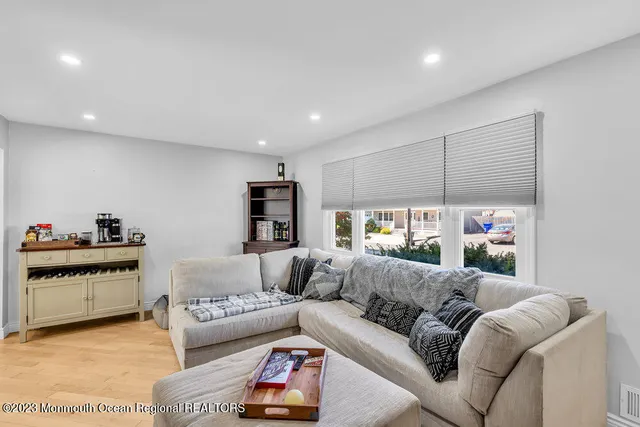 a living room with furniture and a couch