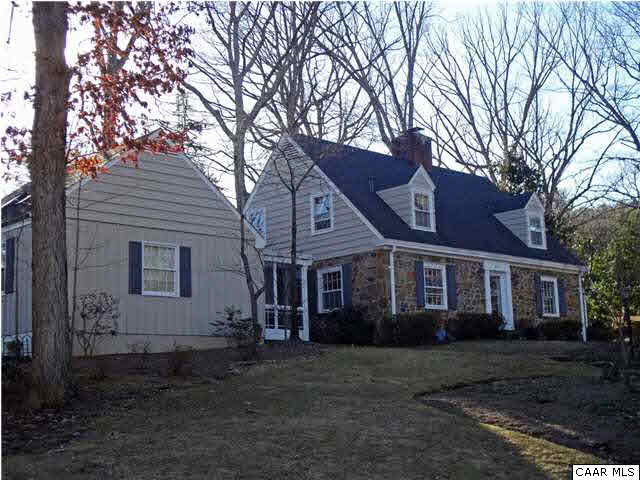 2110 Minor Road Charlottesville, VA 22903 - Photo 1 of 1 a front view of a house with a yard and trees