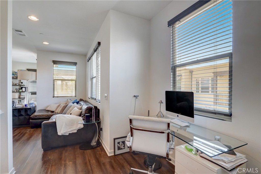 44 Hoya Street Rancho Mission Viejo, CA 92694 - Photo 16 of 32 a living room with furniture and a flat screen tv