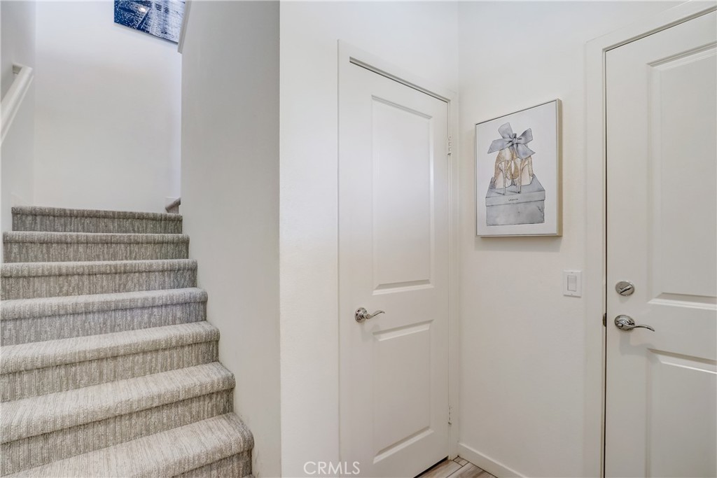44 Hoya Street Rancho Mission Viejo, CA 92694 - Photo 17 of 32 a view of a hallway with stairs