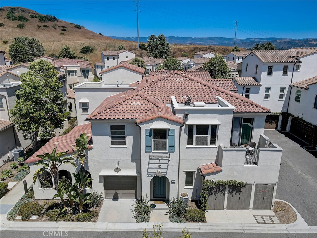 44 Hoya Street Rancho Mission Viejo, CA 92694 - Photo 28 of 32 an aerial view of a house with a yard
