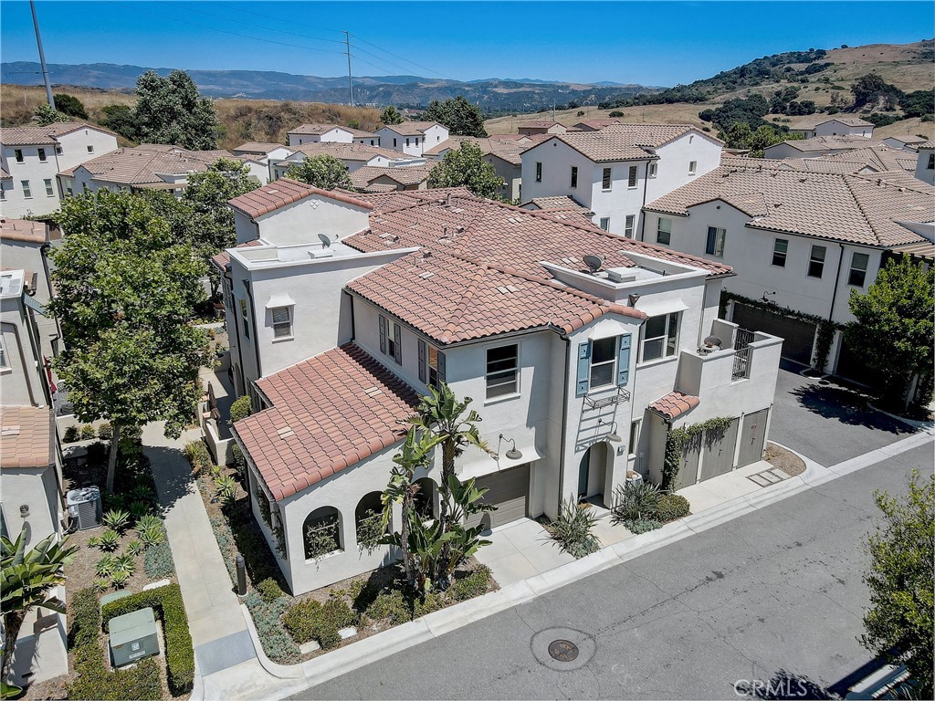 44 Hoya Street Rancho Mission Viejo, CA 92694 - Photo 29 of 32 an aerial view of a house with a big yard