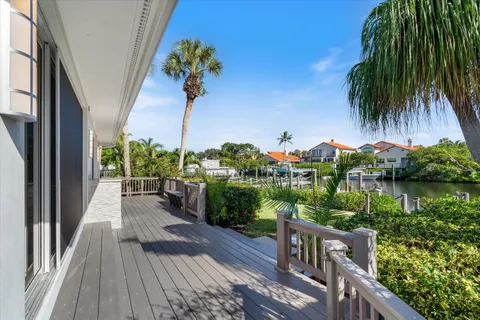 an aerial view of a house with outdoor space