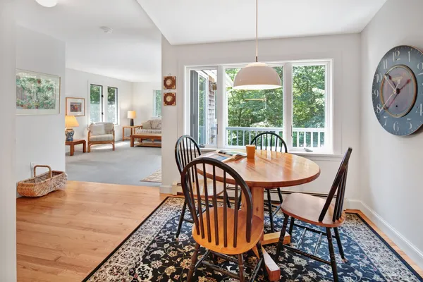 a view of a dining room with furniture window and outside view