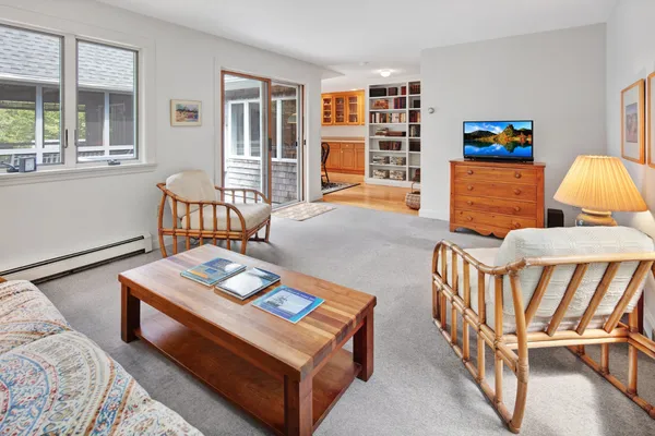 a living room with furniture and a window