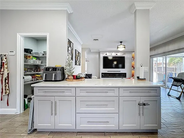 a spacious bathroom with double vanity and a mirror
