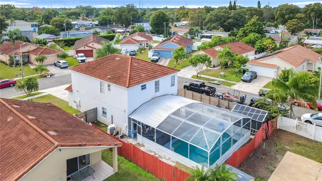 an aerial view of an buildings and street
