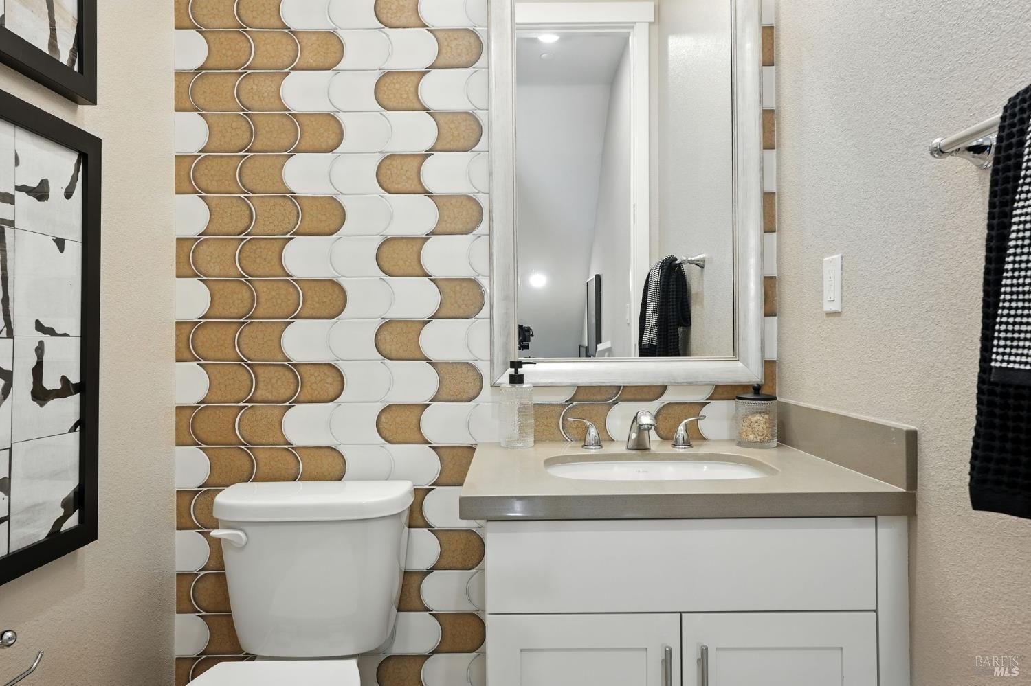 104 Cardamom Lane, Unit 1103 Morgan Hill, CA 95037 - Photo 15 of 19 a bathroom with a sink toilet and shower