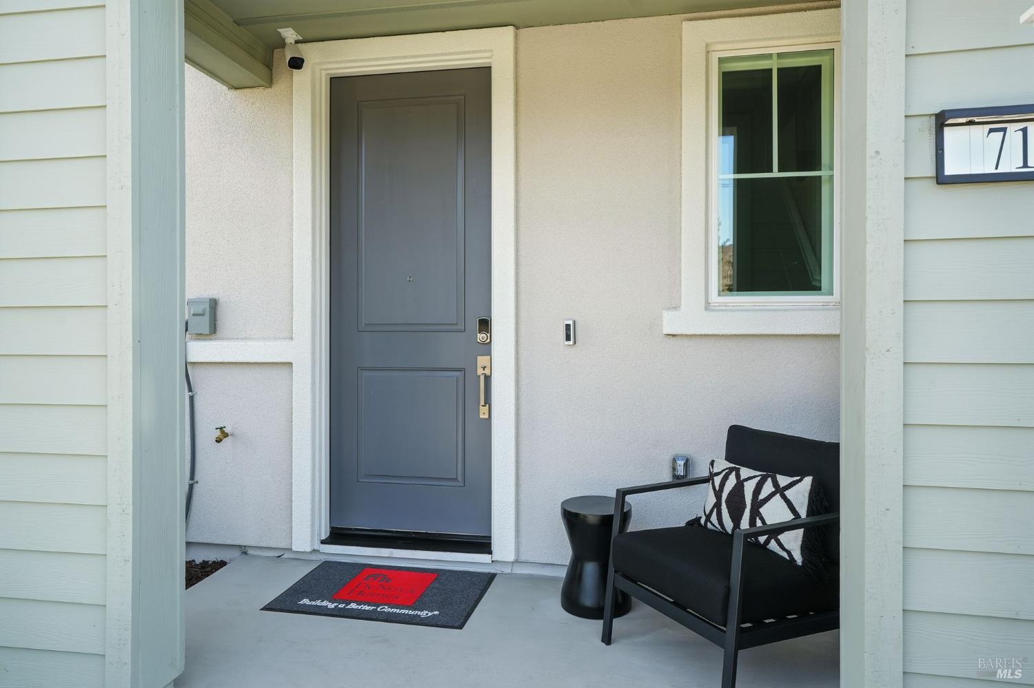 104 Cardamom Lane, Unit 1103 Morgan Hill, CA 95037 - Photo 2 of 19 a living room with furniture and a window
