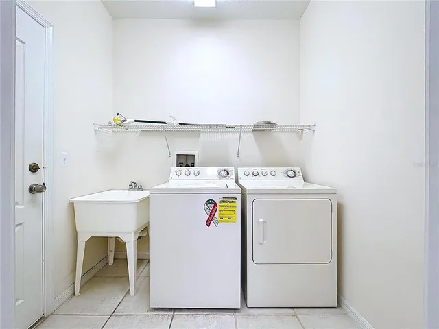 a view of a glass door with a yard