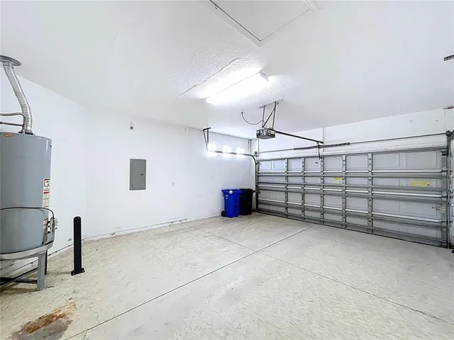 a view of an outdoor space with furniture and garden