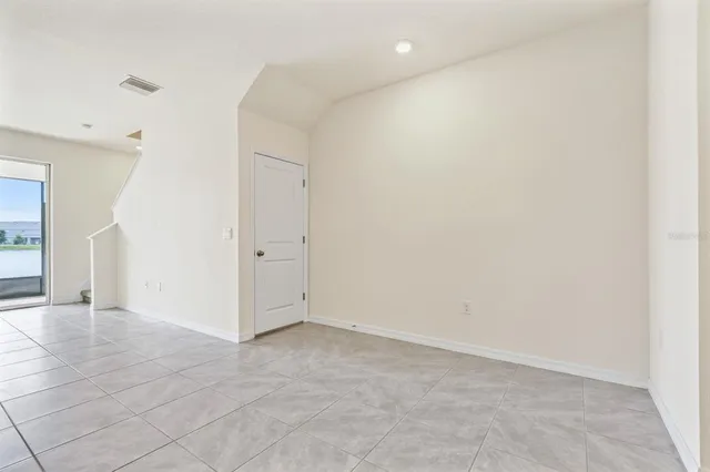 an empty room with a natural light