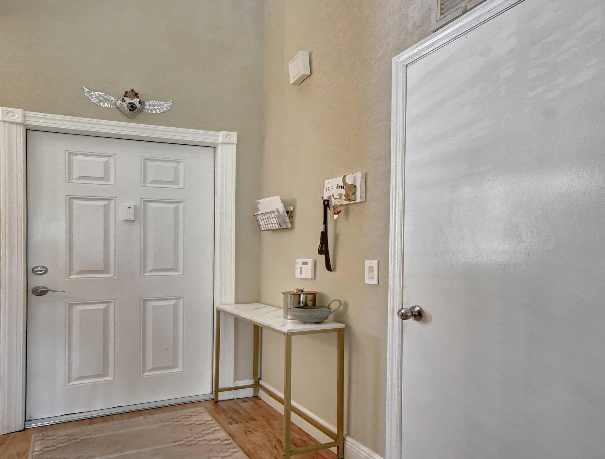 6682 Via Regina Boca Raton, FL 33433 - Photo 9 of 46 a bathroom with a sink vanity and a mirror