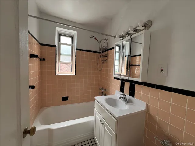 a bathroom with a sink and a bathtub