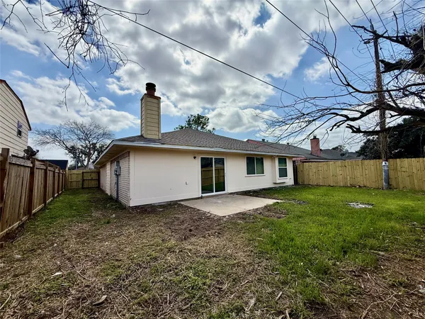 a view of a backyard with a garden