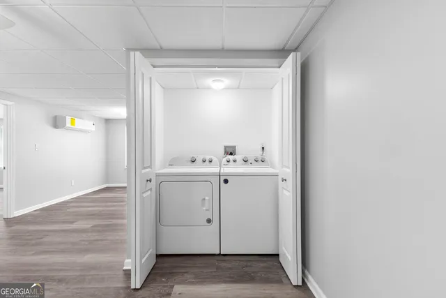 a view of hallway with washer and dryer