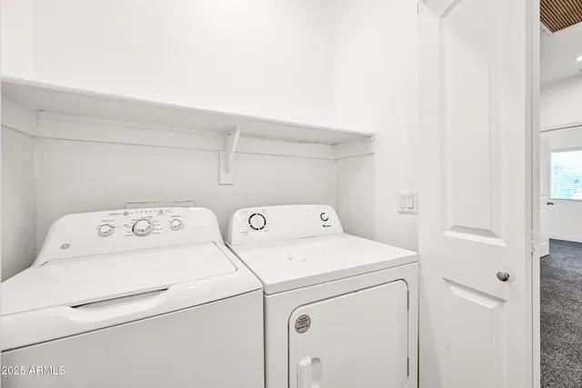 a view of a house with a street