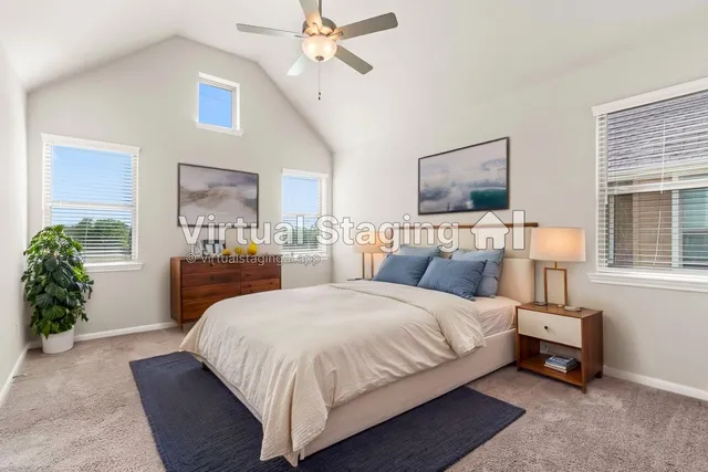 a bathroom with a granite countertop sink and a bathtub