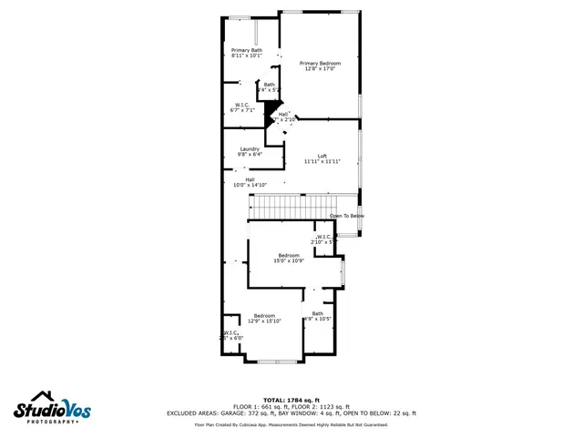 a picture of a bathroom with a shower