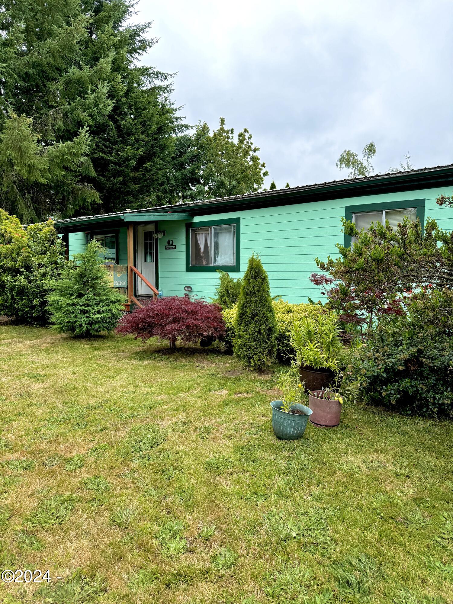 724 Southwest Ferry Avenue, Unit 73 Siletz, OR 97380 - Photo 1 of 24 Exterior
