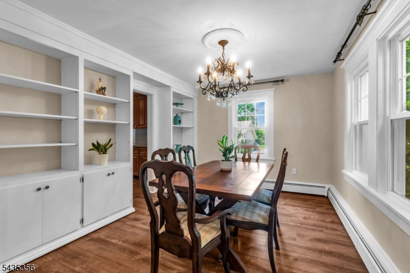105 Somerville Road Bedminster, NJ 07921 - Photo 7 of 36 a view of a dining room with furniture window and wooden floor