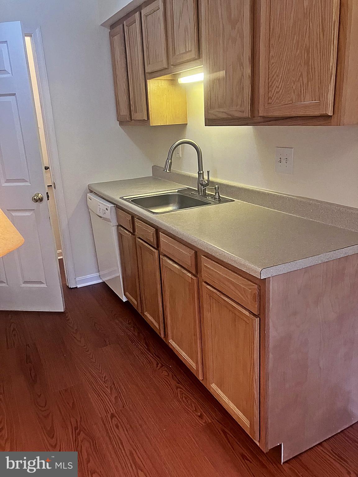 14909 Cleese Court, Unit 4CA Silver Spring, MD 20906 - Photo 15 of 43 a bathroom with a sink and a mirror