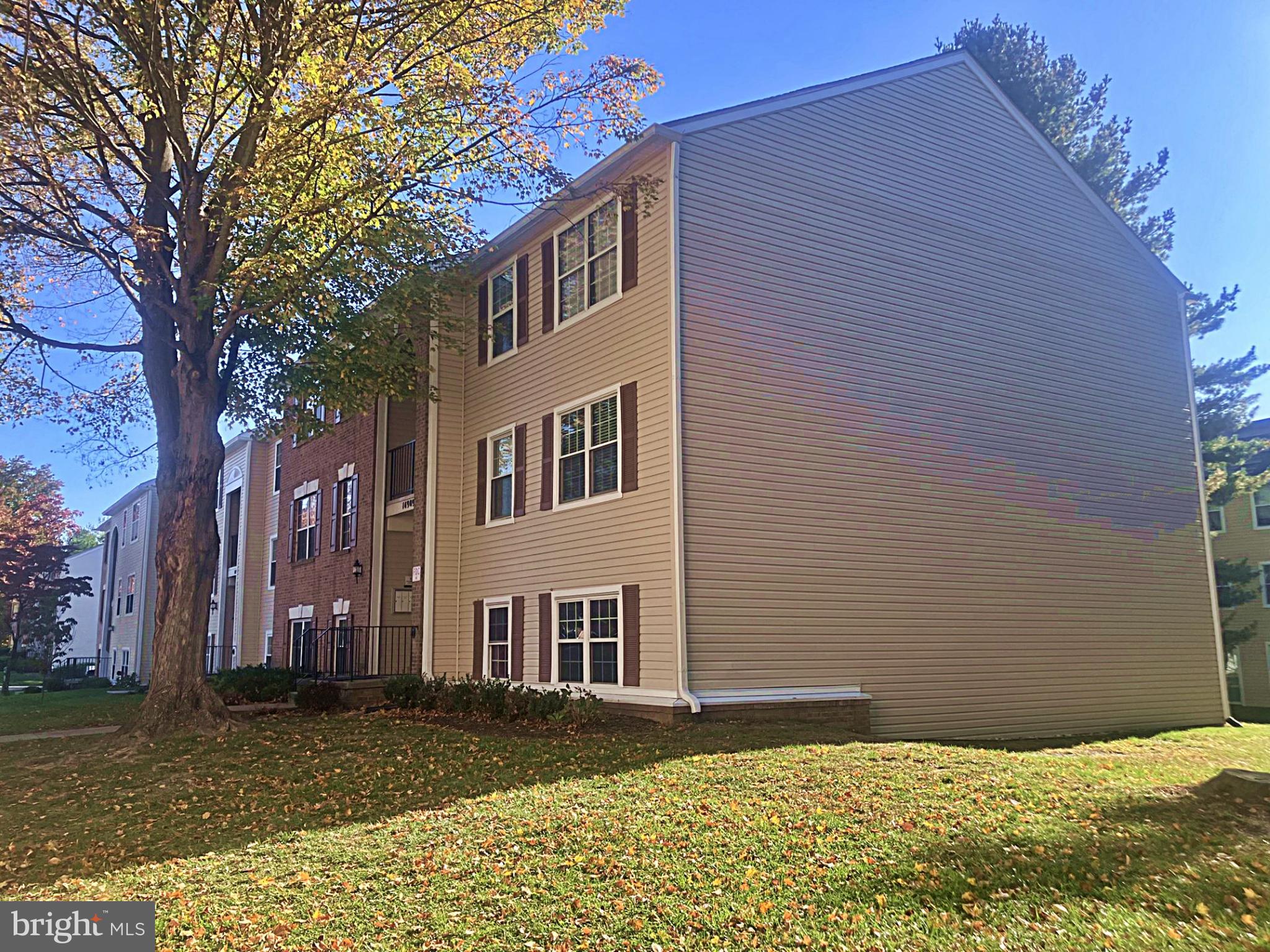 14909 Cleese Court, Unit 4CA Silver Spring, MD 20906 - Photo 42 of 43 a view of a house with a yard