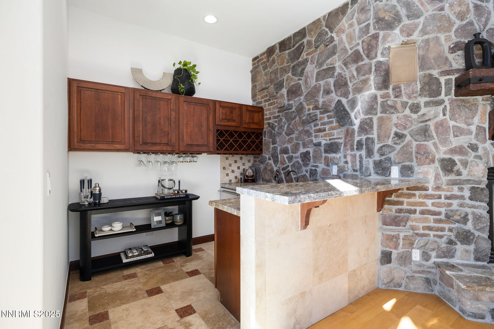 12900 Silver Wolf Road Reno, NV 89511 - Photo 16 of 51 a kitchen with granite countertop a sink and a stove
