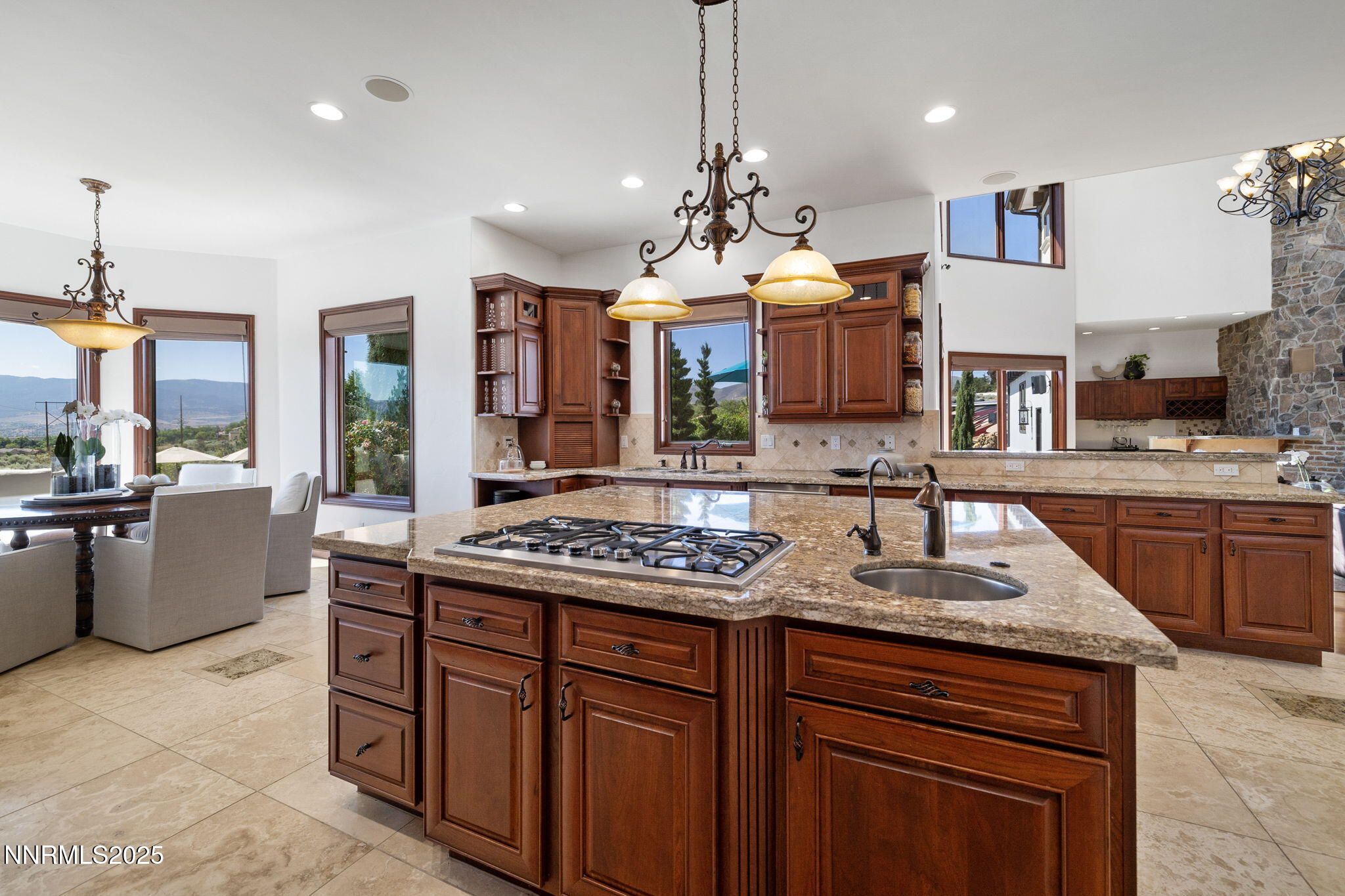 12900 Silver Wolf Road Reno, NV 89511 - Photo 17 of 51 a kitchen with a sink stove and refrigerator