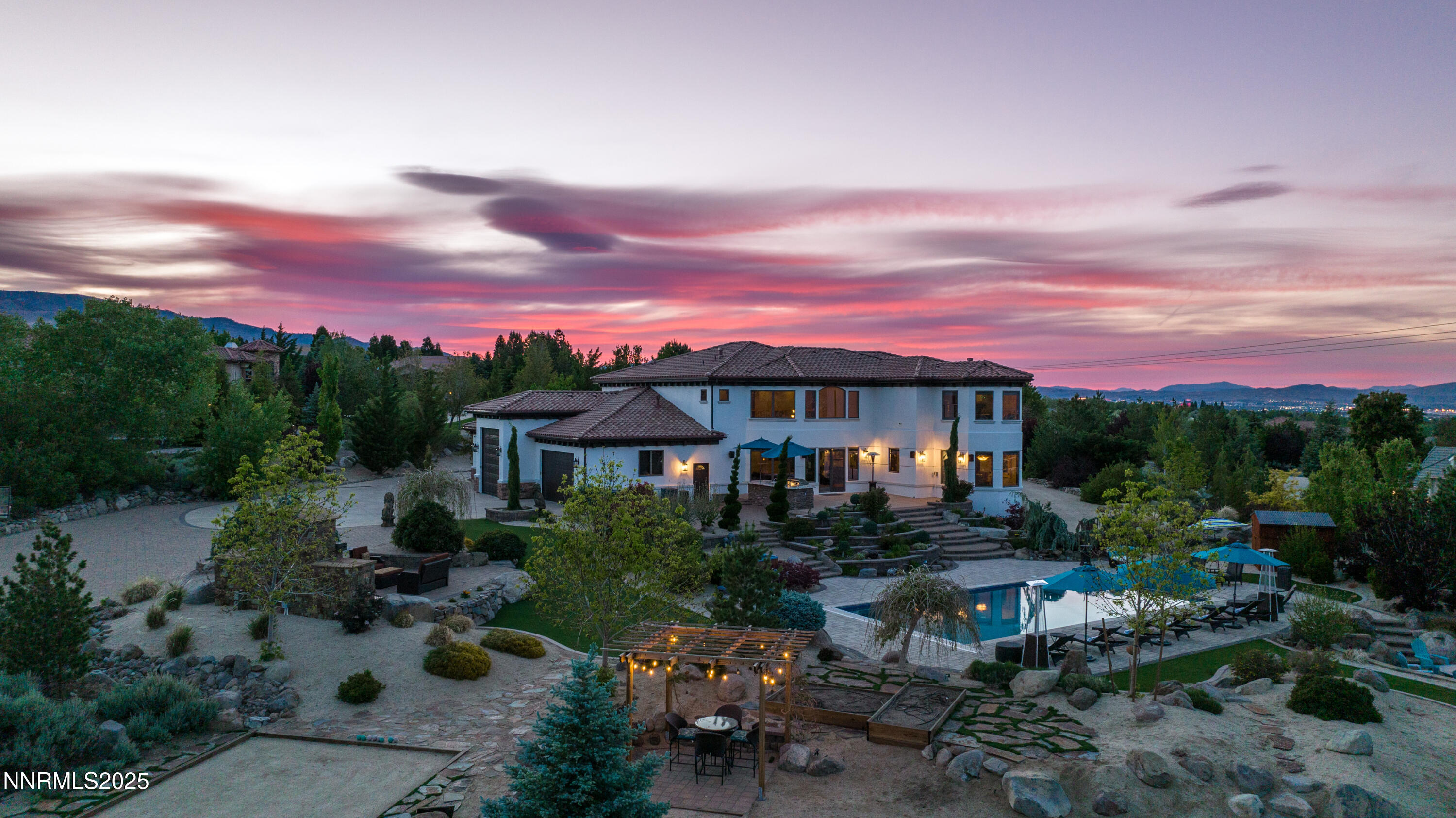 12900 Silver Wolf Road Reno, NV 89511 - Photo 3 of 51 a front view of a house with a yard