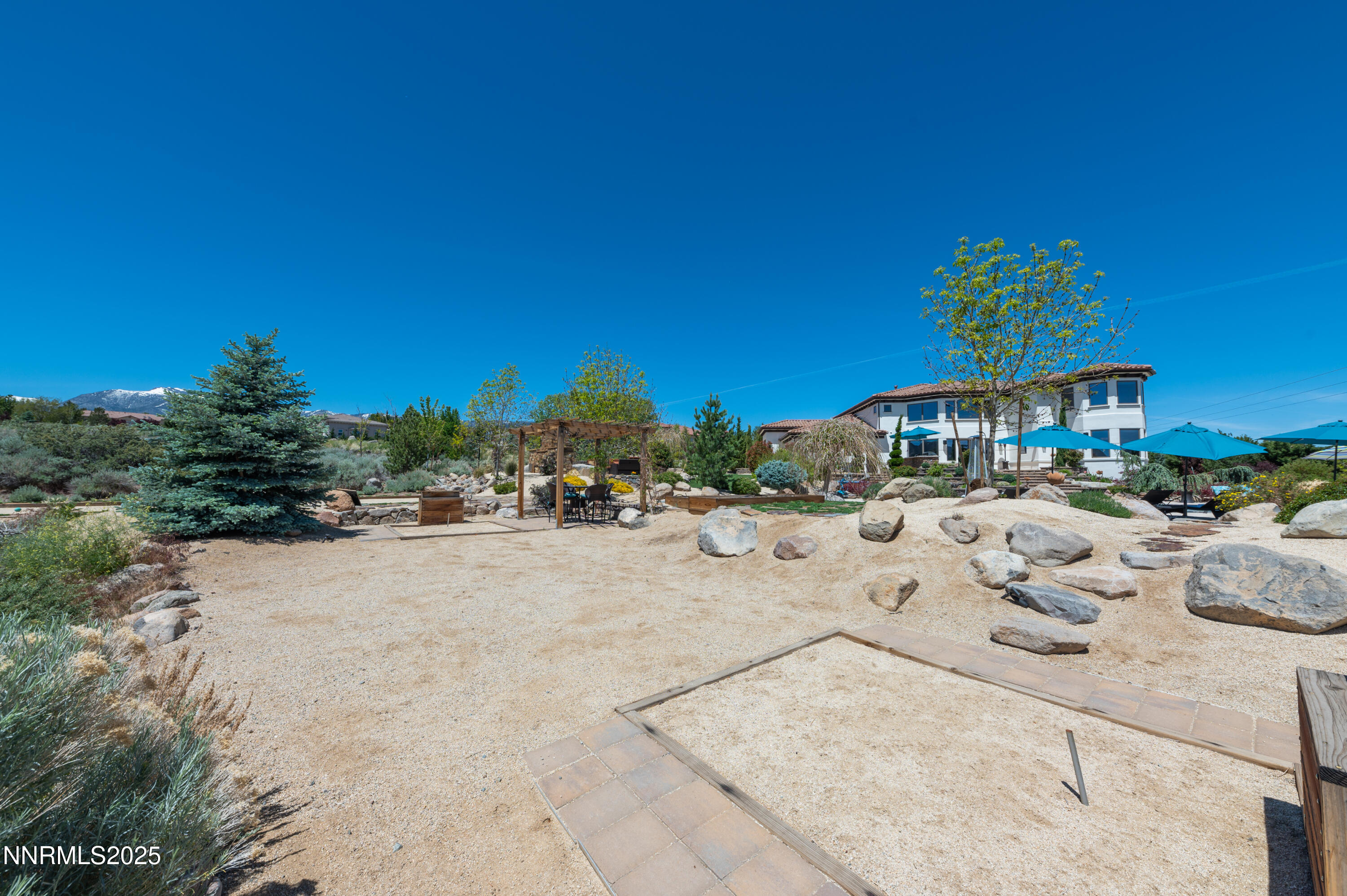 12900 Silver Wolf Road Reno, NV 89511 - Photo 37 of 51 a view of a terrace with chairs