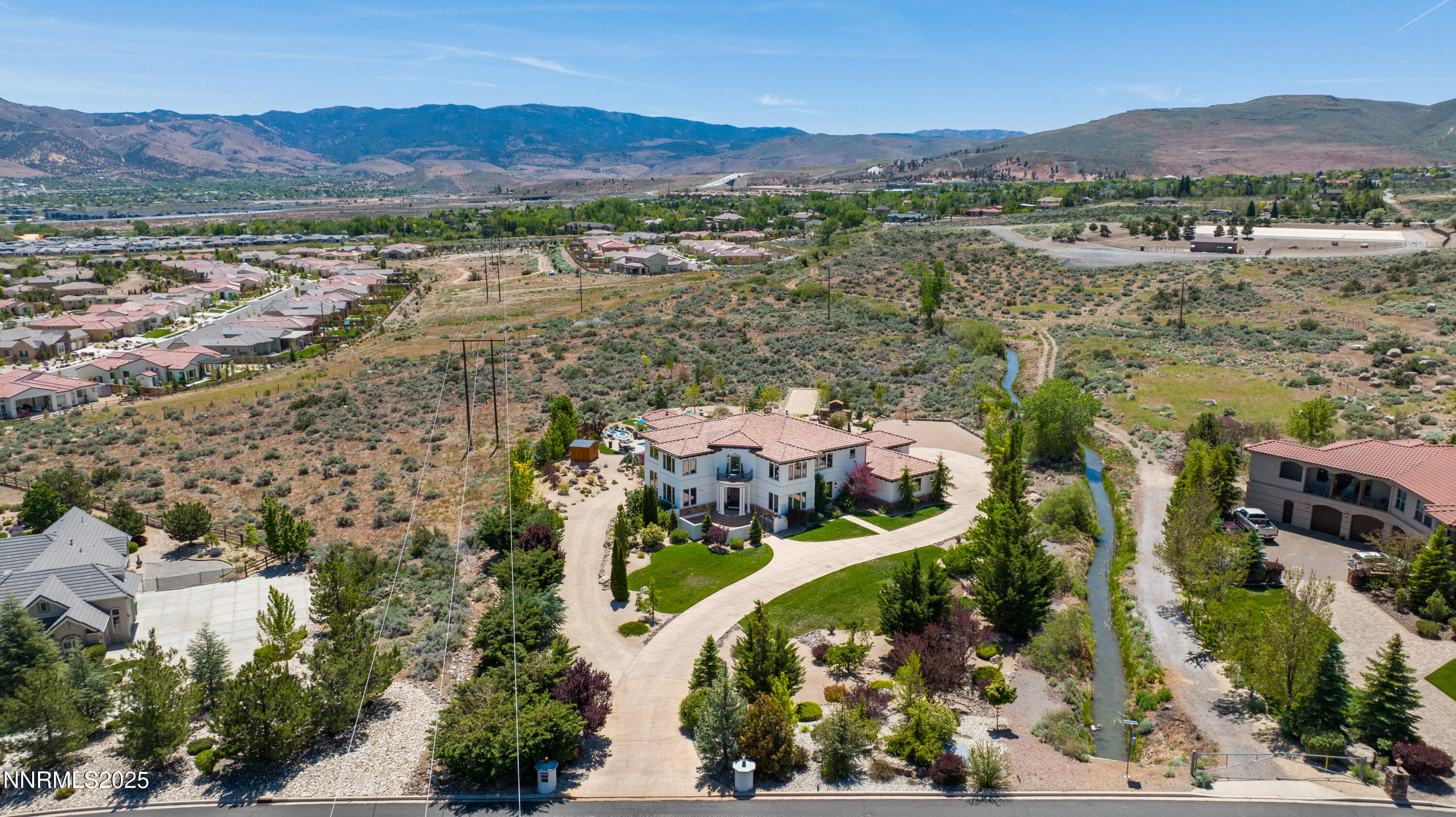 12900 Silver Wolf Road Reno, NV 89511 - Photo 41 of 51 an aerial view of houses with a lake