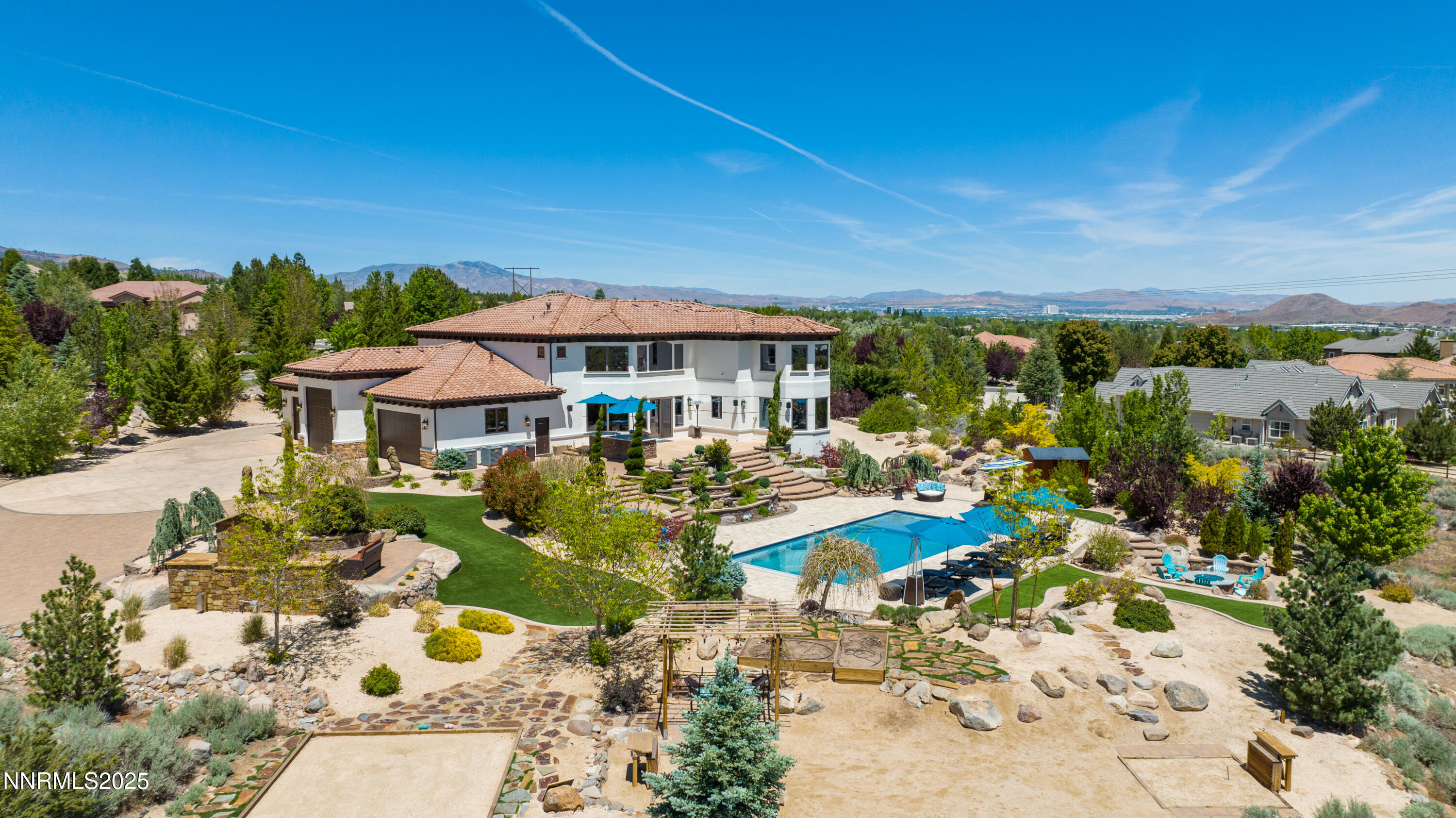 12900 Silver Wolf Road Reno, NV 89511 - Photo 42 of 51 a view of a patio with swimming pool garden and patio