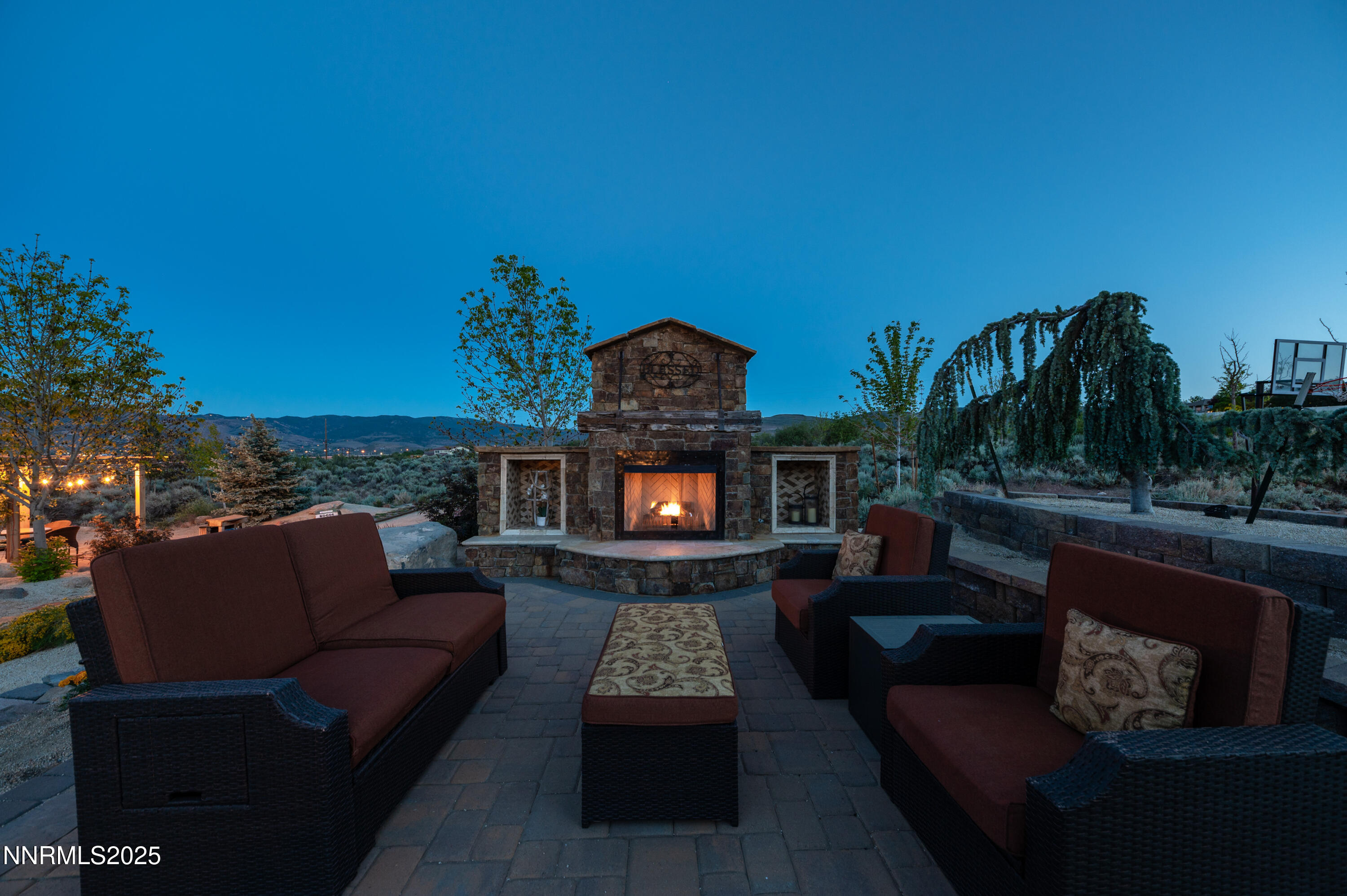 12900 Silver Wolf Road Reno, NV 89511 - Photo 49 of 51 a living room with furniture and a fireplace