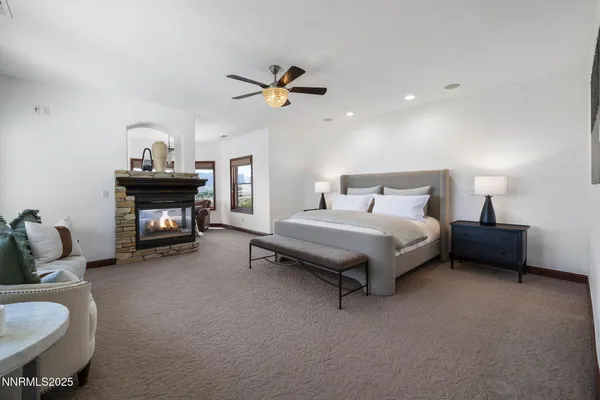 a bedroom with furniture and a bed