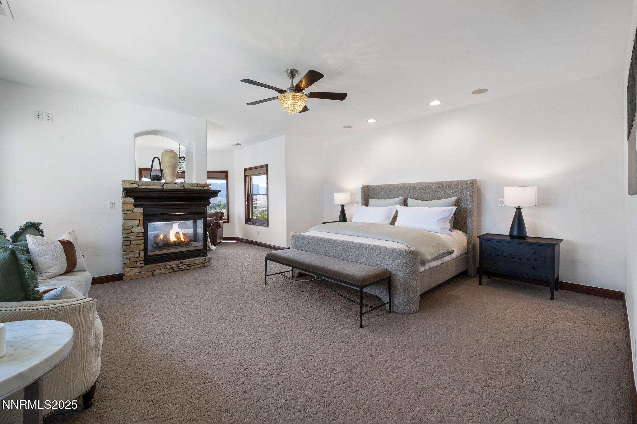 12900 Silver Wolf Road Reno, NV 89511 - Photo 7 of 51 a bedroom with furniture and a bed