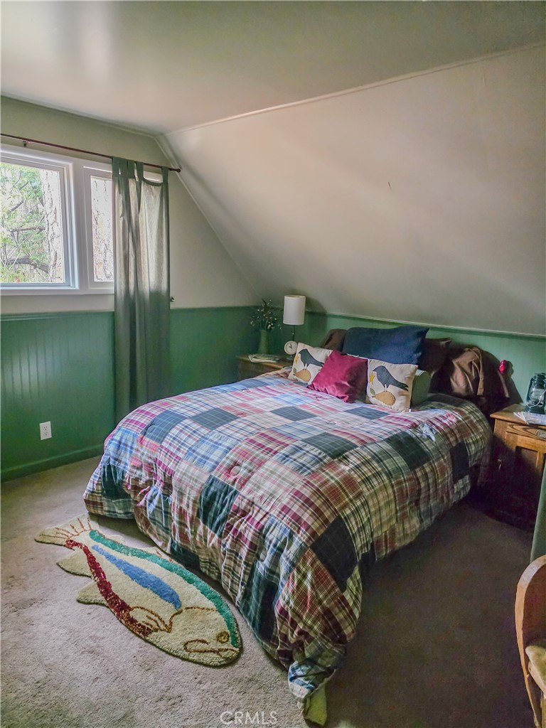 52745 Sylvan Way Idyllwild, CA 92549 - Photo 18 of 31 a bedroom with a bed and a window