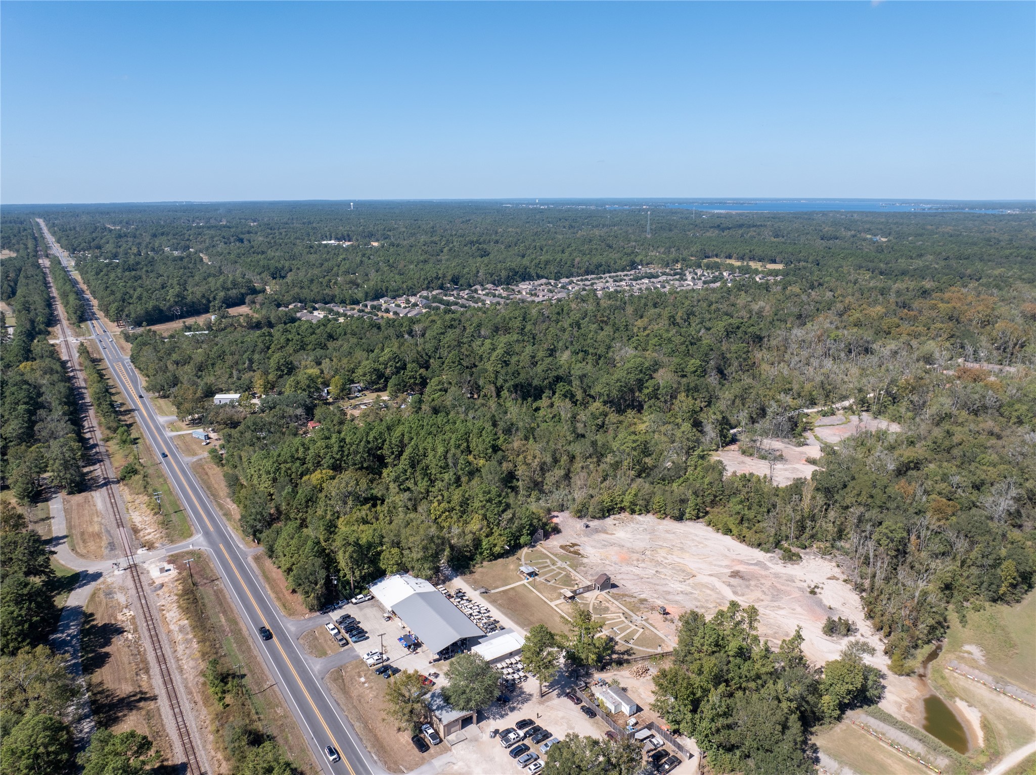 0 Fm 2854 Conroe, TX 77304 - Photo 15 of 15 an aerial view of a residential houses with city view