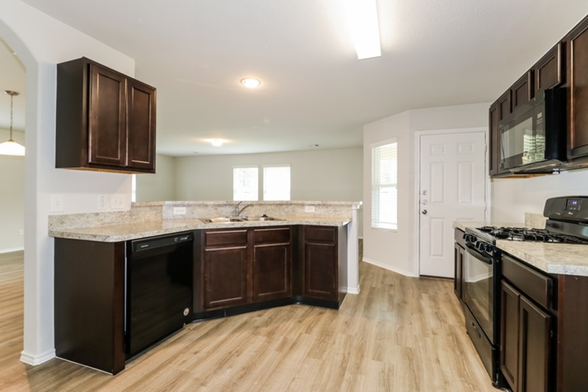 2743 Madison Court Conroe, TX 77304 - Photo 4 of 15 Photos may be representative of the floor plan and not the exact home. Finishes, layout, and features of the actual property for lease may vary.