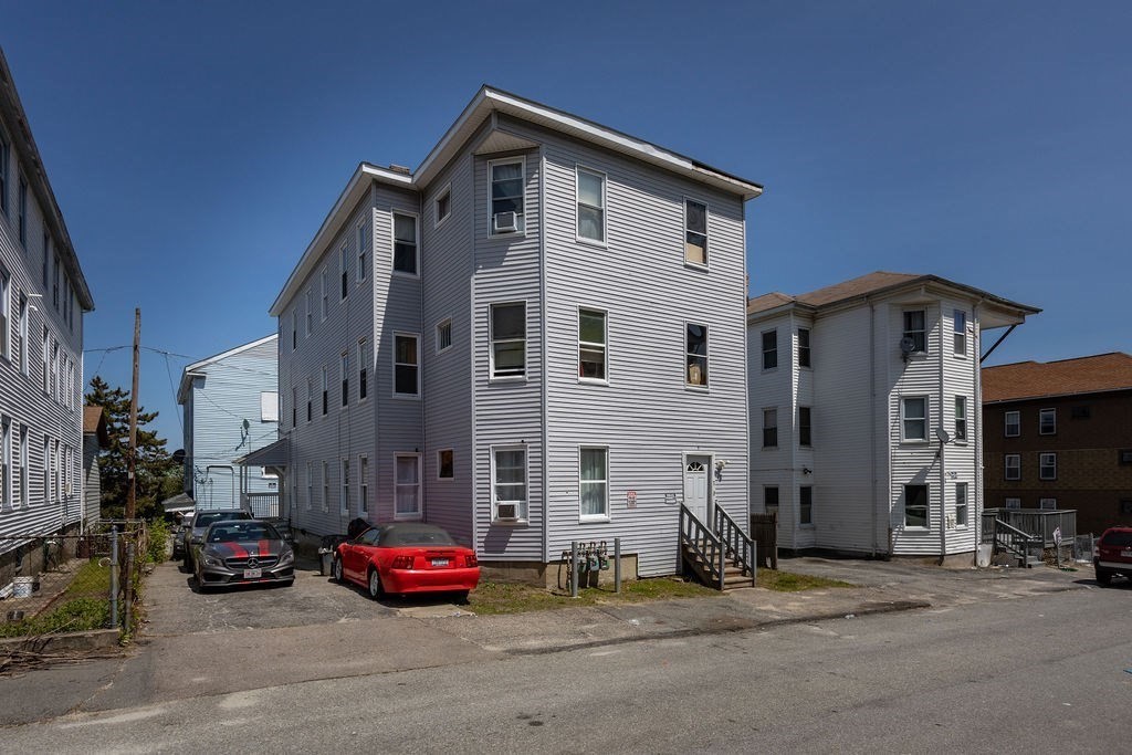 a car parked in front of a house