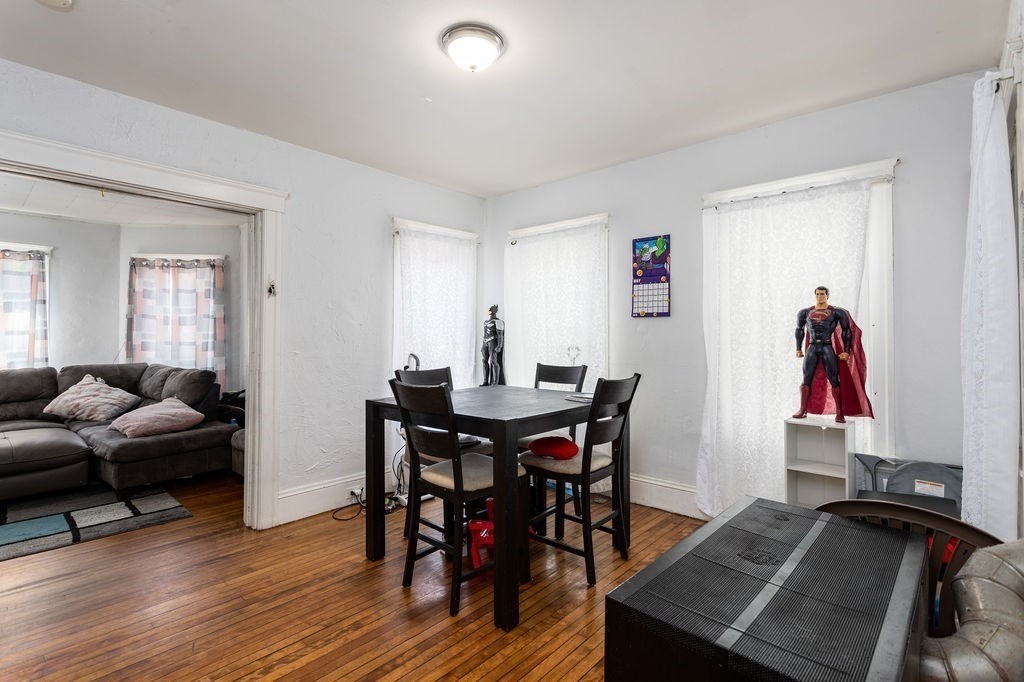 7 Mott Street Worcester, MA 01604 - Photo 13 of 20 a view of a dining room with furniture and wooden floor