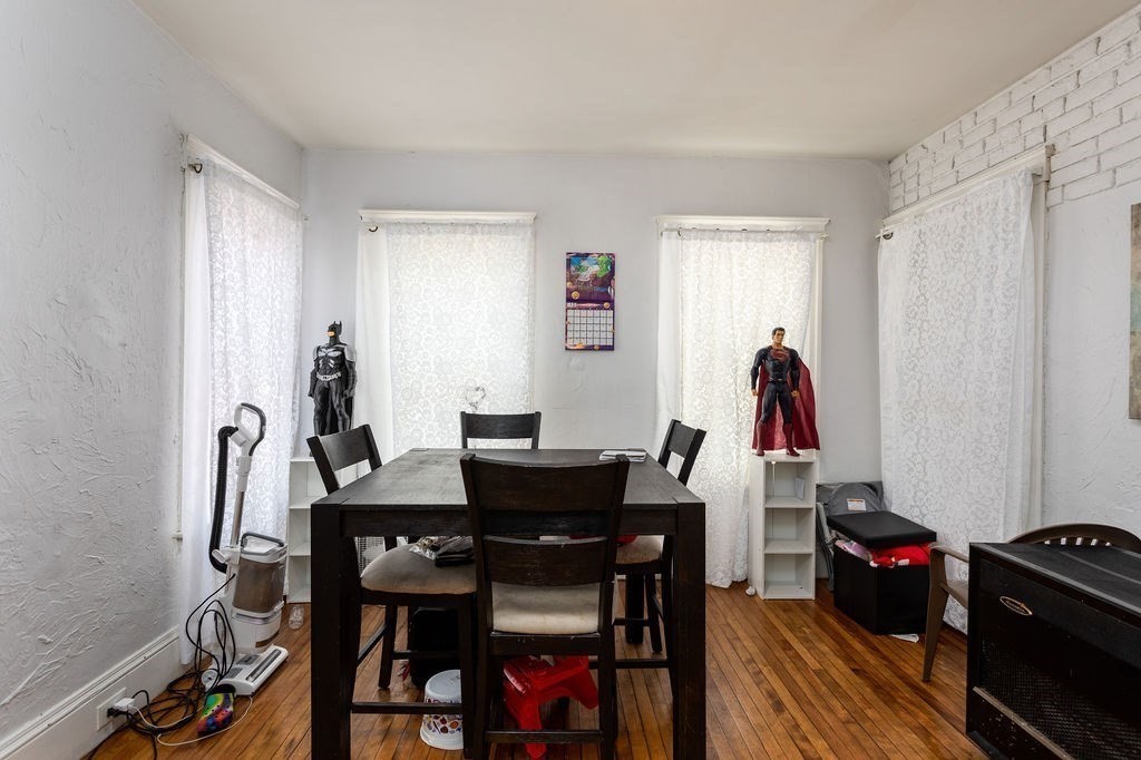 7 Mott Street Worcester, MA 01604 - Photo 14 of 20 a view of a workspace with furniture and window in a room