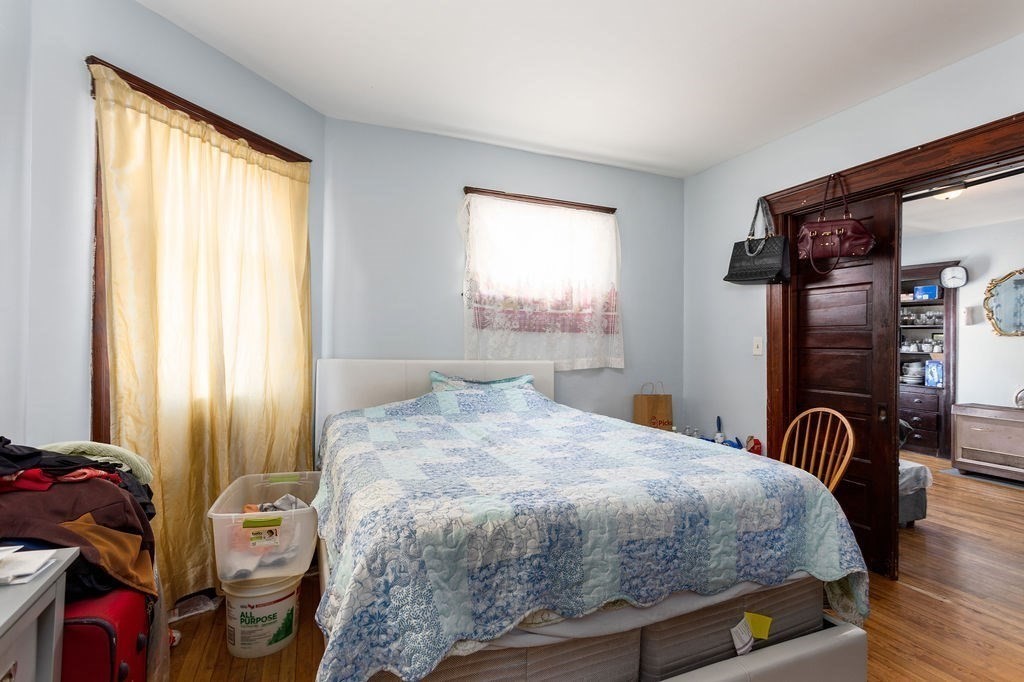 7 Mott Street Worcester, MA 01604 - Photo 3 of 20 a bedroom with a bed and a closet